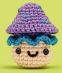 The Woobles Crochet Kit | Irving the Mushroom crocheted mushroom with purple cap and smiling face