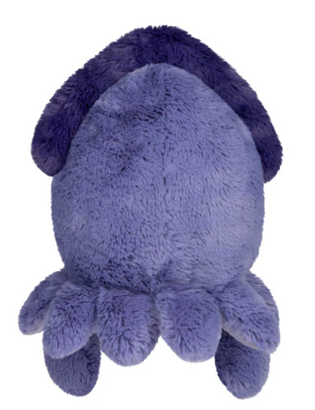 Plush soft toy resembling a rounded sea creature in shades of blue and purple with textured fabric details