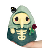 Plush toy with a pale face, long nose, green hood, dark teal body with bone design, and holding a red flower