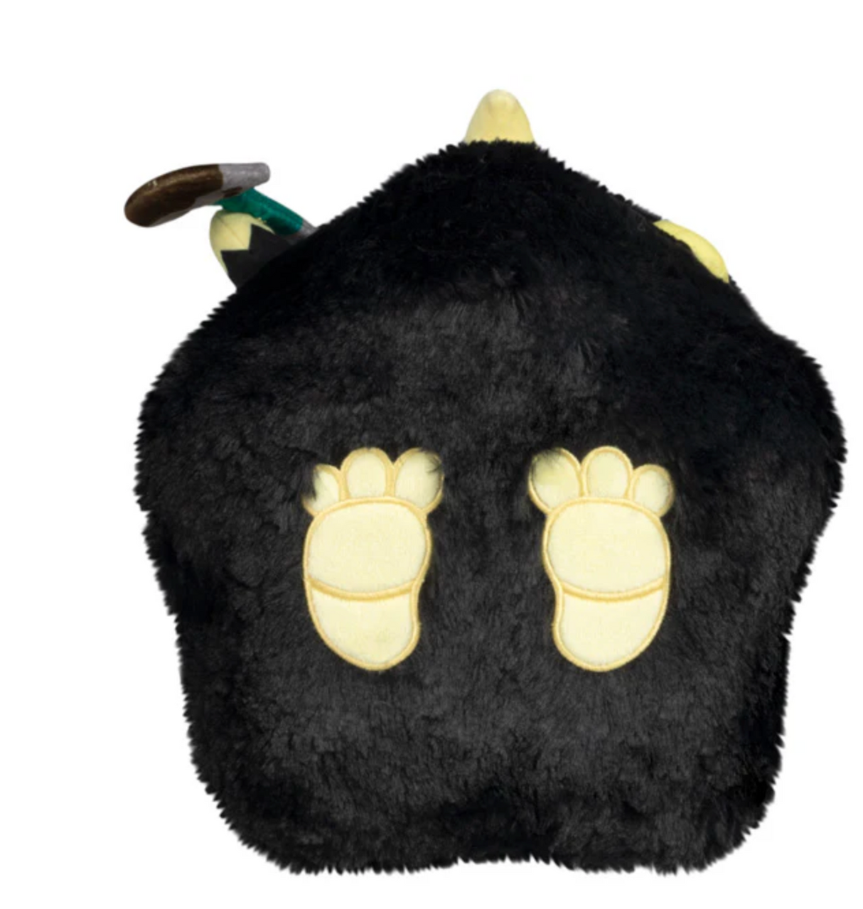 Soft black plush shaped like a round animal with light yellow paw prints and small decorative horns