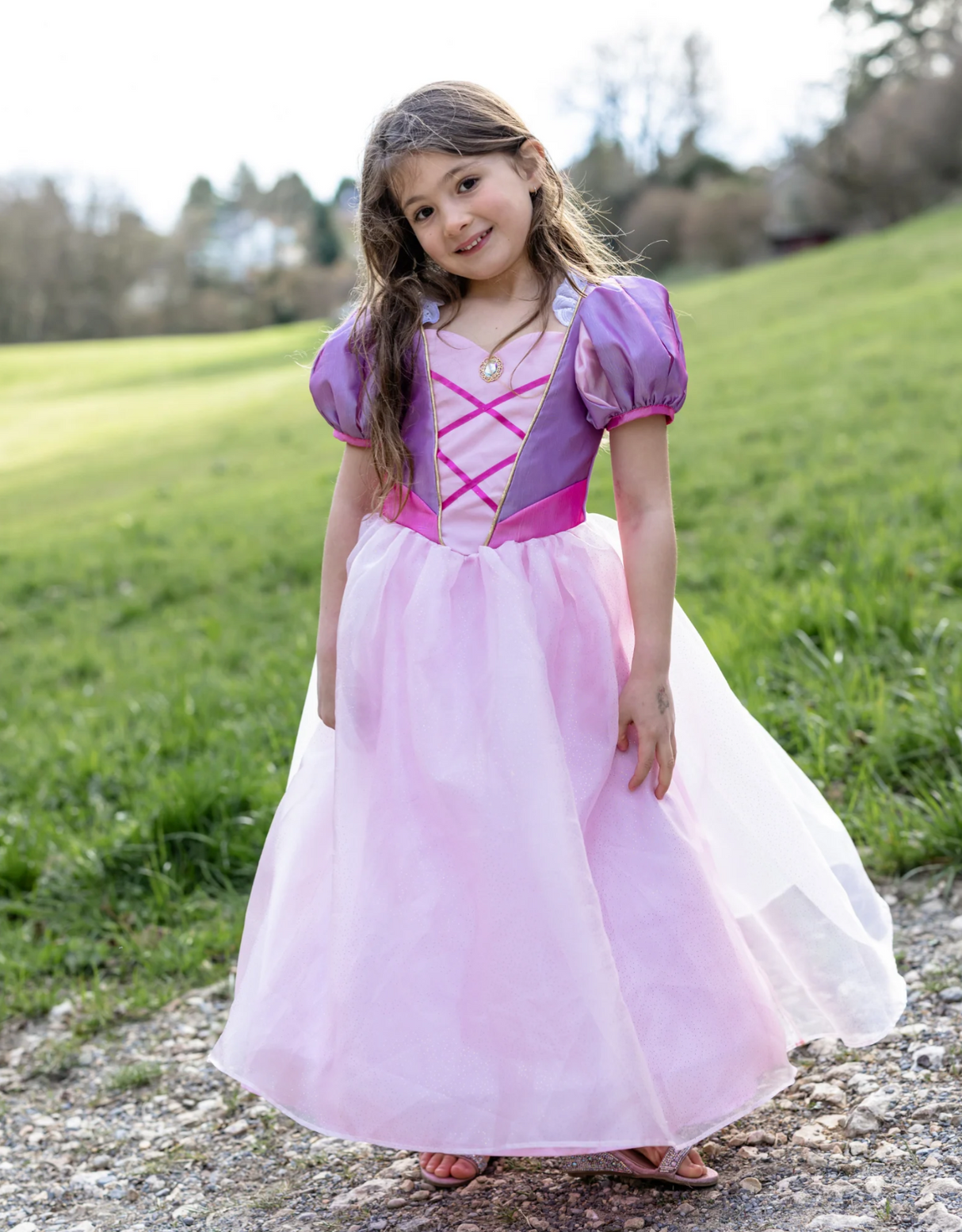 Velvety Soft Once Upon A Tower Princess Gown | Size 7-8 worn by smiling child outdoors