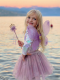 Royal Fairy Princess Skirt Set | Purple worn by a child with fairy wings beside the water