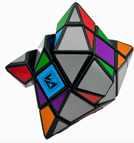 Inverse Volstar colorful geometric twist puzzle with triangular facets in red blue green orange purple and gray