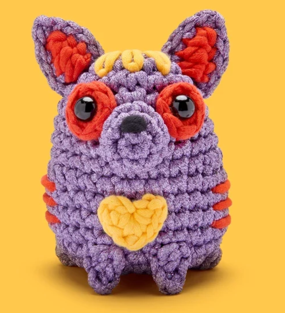 The Woobles Crochet Kit | Pablo the Alebrije Dog purple crocheted dog with red ears and yellow heart