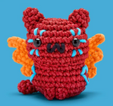 The Woobles Crochet Kit | Maya the Alebrije Cat red crocheted cat with orange wings
