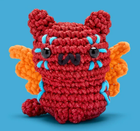 The Woobles Crochet Kit | Maya the Alebrije Cat red crocheted cat with orange wings
