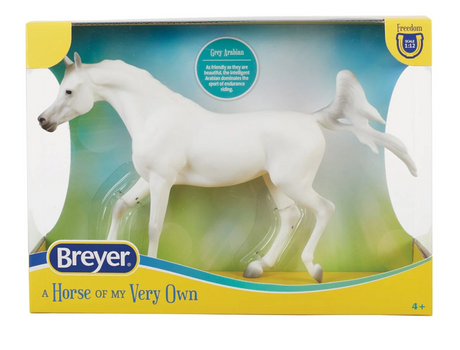 Grey Arabian white horse figure in a colorful box