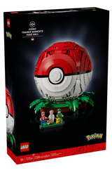 Pokemon Iconic Trainer Moments Poke Ball box featuring a red and white Poke Ball with trainers and jungle scenery