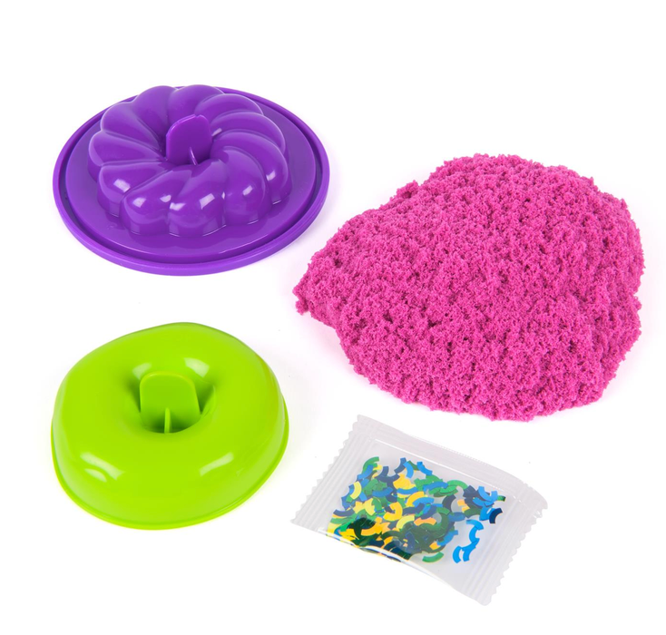 Kinetic Sand Surprise Takeout with pink kinetic sand purple mold green tool and colorful decorations