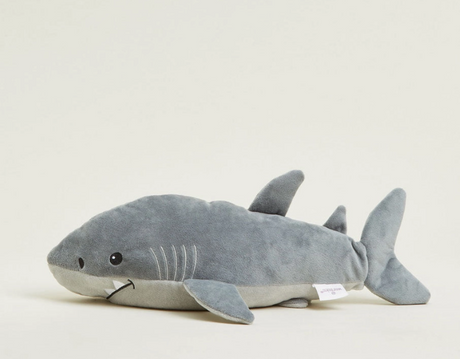 Warmies | Shark gray plush toy with fins, tail, and soft textured details laying on a white background
