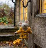 Rainy Day Mouse Felt Ornament featuring a gray felt mouse in a mustard yellow raincoat