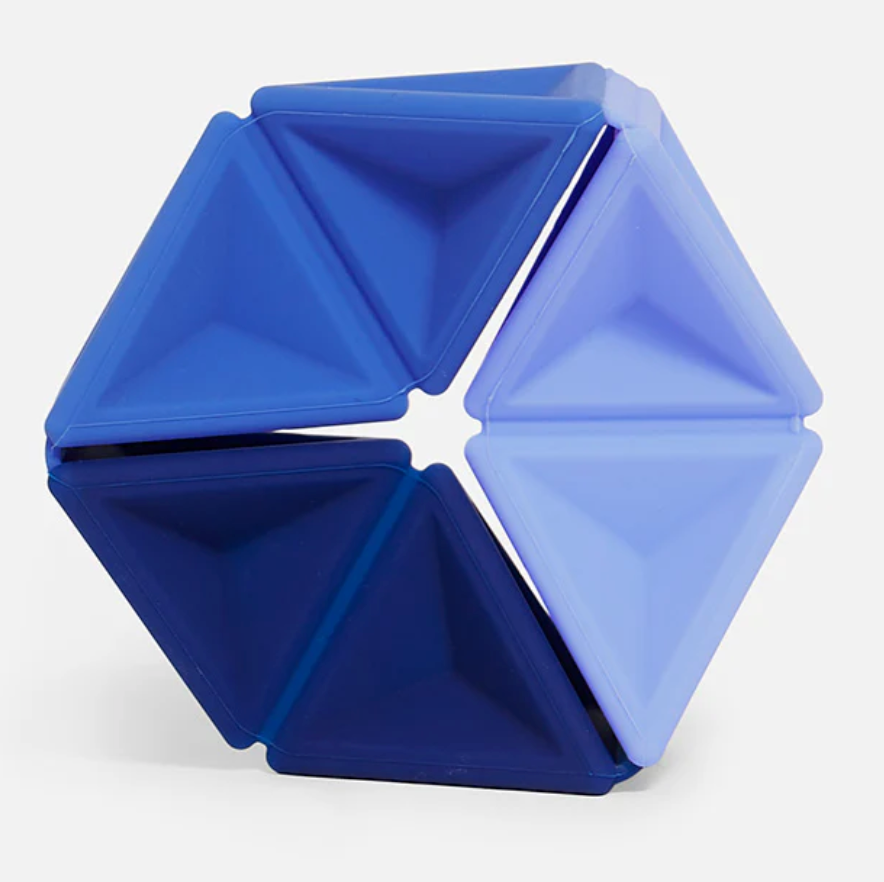 Speks. Pivot. blue hexagonal fidget toy arranged in a geometric shape