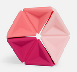 Speks. Pivot. Colorful silicone fidget pieces arranged into a geometric hexagon