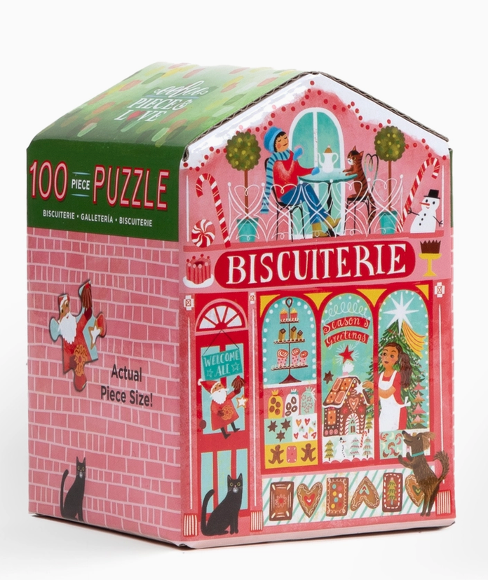 100pc Christmas Market Puzzle in a bakery themed tin with colorful Christmas storefront artwork