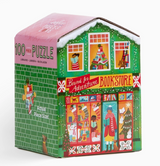 100pc Christmas Market Puzzle in a festive bookstore-shaped box with colorful holiday market artwork