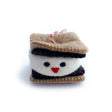 Smiling S'more Felt Ornament with cute marshmallow face sandwiched between felt graham crackers and chocolate layers.