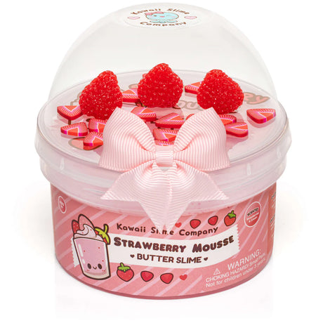 Strawberry Mousse Butter Slime in pink container with strawberry charms and a large pink bow on the lid.