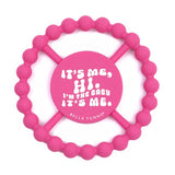 Pink silicone teether with beaded texture and "It's Me Hi" text for soothing baby gums, Teether | It's Me Hi.