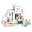 Kitty's Milkshake Van toy with three cat figures, ice cream, doughnuts, and milkshake serving from a white three-wheeler.