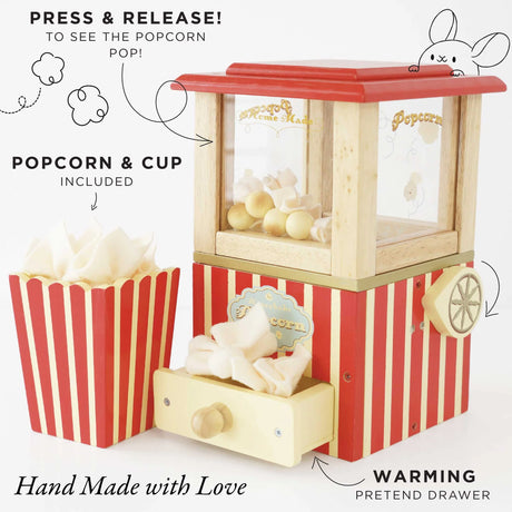 Toy Popcorn Machine with red and cream stripes, hand crank, pretend drawer, felt popcorn, and striped serving cup.