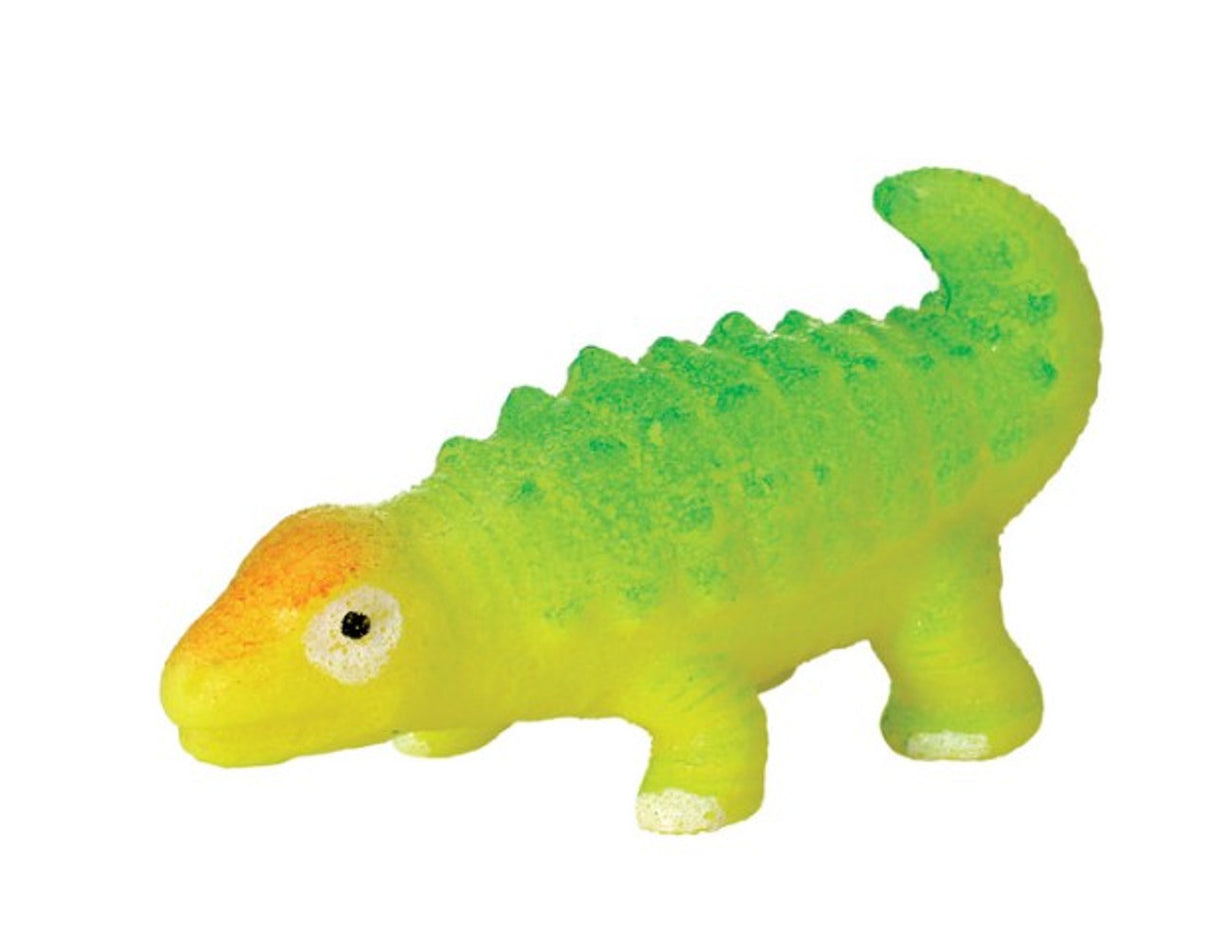 Bright green toy dinosaur with yellow head and textured back, a fun growing collectible for kids.