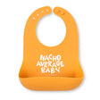 Orange baby bib with catch pocket and playful "Nacho Average Baby" text on front for mess-free feeding.