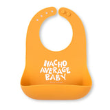 Orange baby bib with catch pocket and playful "Nacho Average Baby" text on front for mess-free feeding.