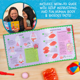 Open colorful educational manual featuring lung and digestive system diagrams with playful illustrations and text blocks