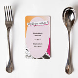 Would You Rather card placed between a fork and spoon showing a fun choice game question about utensils.