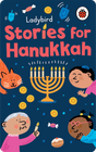 Colorful illustration of children, a cat, and a menorah celebrating Hanukkah with gelt and dreidels around them