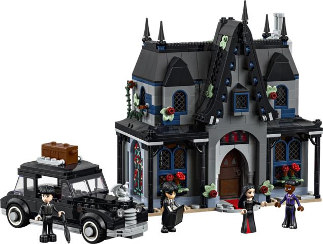 Detailed gothic cottage building kit with minifigure characters and a classic black car for imaginative play scenes