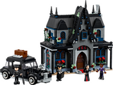 Detailed gothic cottage building kit with minifigure characters and a classic black car for imaginative play scenes