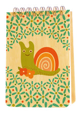 Mini Wood Notebook | Snail with spiral binding, featuring a colorful snail and floral design on birch wood cover.