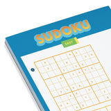 Close-up of easy Sudoku puzzle on a blue game pad for fun car travel activities without screens or batteries
