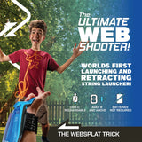 Young boy excitedly using a string-launching webshooter outdoors demonstrating fun superhero play with glowing string loops