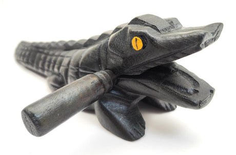 Wooden Croaking Alligator with dark green waxed finish and mallet, handcrafted Thai musical instrument drum rasp.