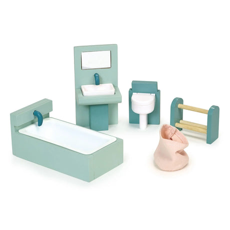 Miniature dollhouse bathroom set with bathtub, sink, toilet, towel rack, and laundry basket in soft pastel colors.