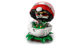 Pokemon Iconic Trainer Moments Poke Ball opened to reveal a detailed Pokemon scene with greenery and figures