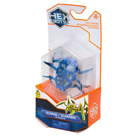 Hex Bots Scarab mechanical beetle robot toy with six legs in clear orange and blue packaging for ages 4 and up.