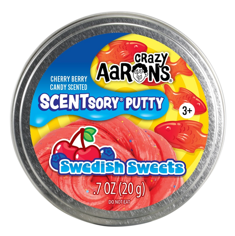 Round metal tin of bright red putty with candy-themed label featuring cherry and fish graphics