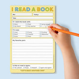 Child filling out a colorful I Read a Book playtime pad with prompts about reading experience and favorite book parts