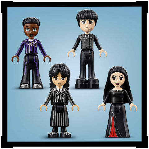 Four minidoll figures including Wednesday and Morticia Addams with detailed clothing and expressions against a blue background