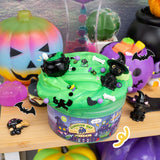 Curious Cat Workshop Slime tub with green slime and spooky Halloween cat decorations