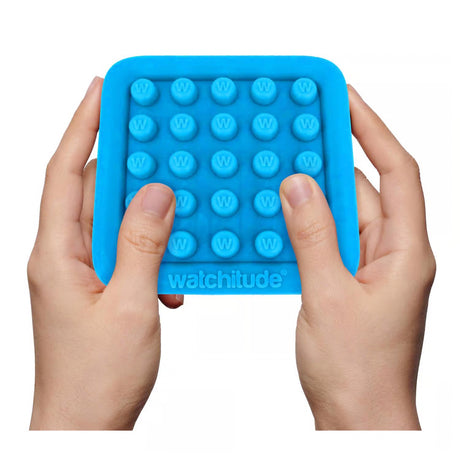 Hands holding a blue silicone endless bubble wrap fidget toy designed for sensory popping fun and stress relief.