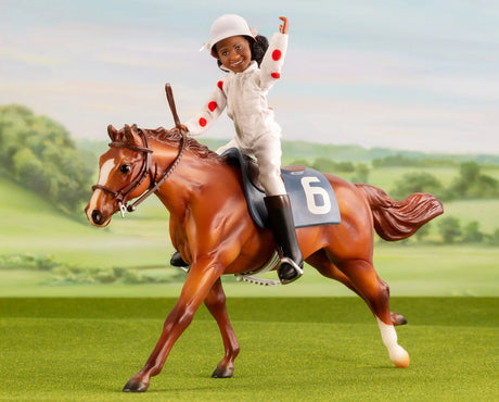 Cheryl White & Jetolara Breyer model set featuring jockey figure on chestnut horse with race saddle and bridle