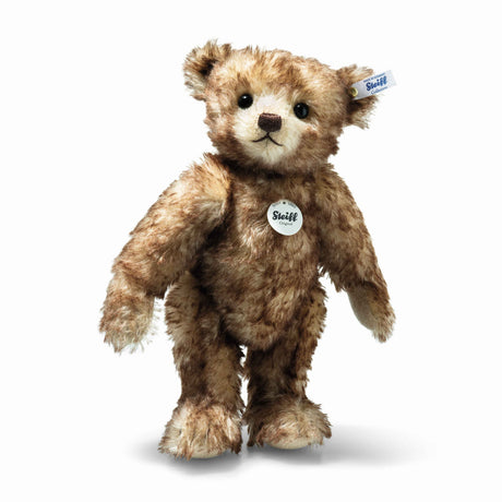 Teddy Bear Classic Limited Edition with mohair coat, hand-stitched features, and posable five-way jointing, 13 inches tall.