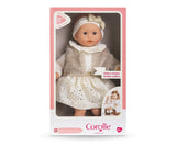 Calin Margaux Enchanted Woods doll in a pink box wearing a cream dress and gray coat