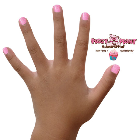 Nail Polish Scented Cupcake Cutie on hand, glitter light pink color with a vanilla cake scent and non-toxic formula.