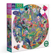 Vibrant round puzzle with colorful flowers, butterflies, birds, mushrooms, and lush garden plants in a circular design