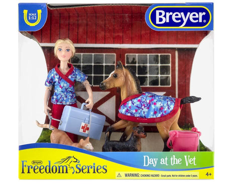 Breyer Day at the Vet set with articulated doll, foal, cat, dog, vet bag, bucket, and stethoscope in 1:12 scale.